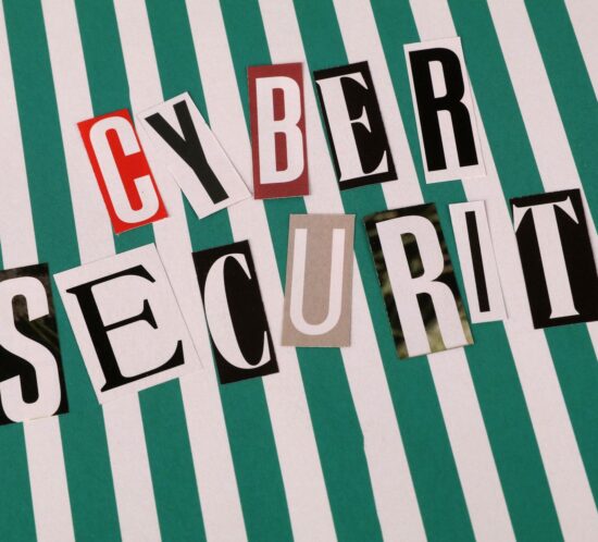 Cyber security concept depicted with a creative text collage on striped background.